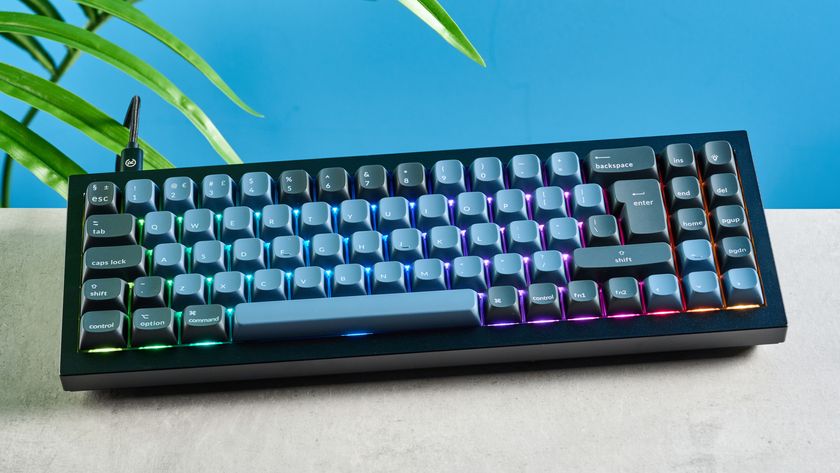 A black and blue Keychron Q7 wired mechanical keyboard that&#039;s made of metal