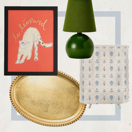 Leopard print artwork, a green lamp, a golden wooden tray, a shower curtain. 