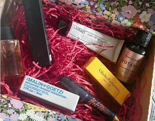 An example of a Liberty Beauty Drop Box contents. The box is open showing several products inside.