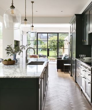 dark modern shaker kitchen with marble kitchen island
