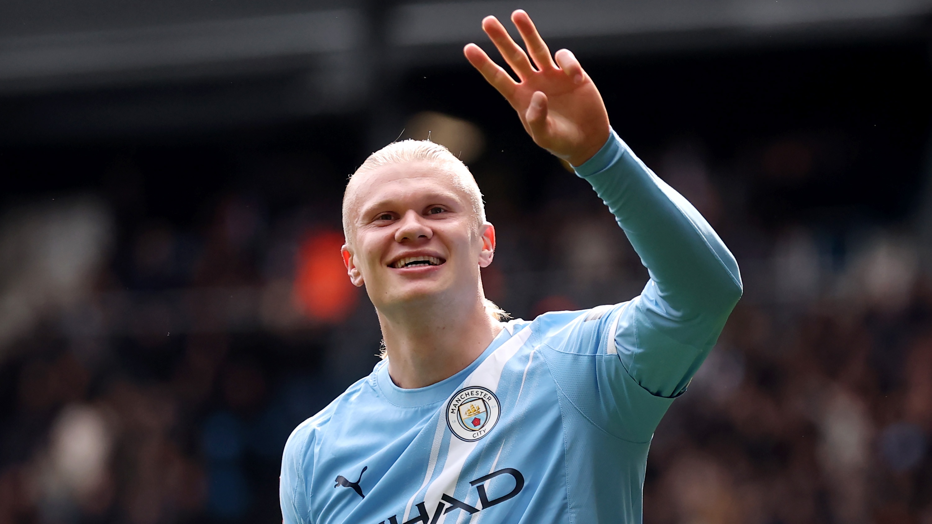 Erling Haaland of Manchester City celebrates scoring his team's fourth goal, and his hat-trick during the Emirates FA Cup Quarter Final match between Manchester City and Liverpool at Etihad Stadium