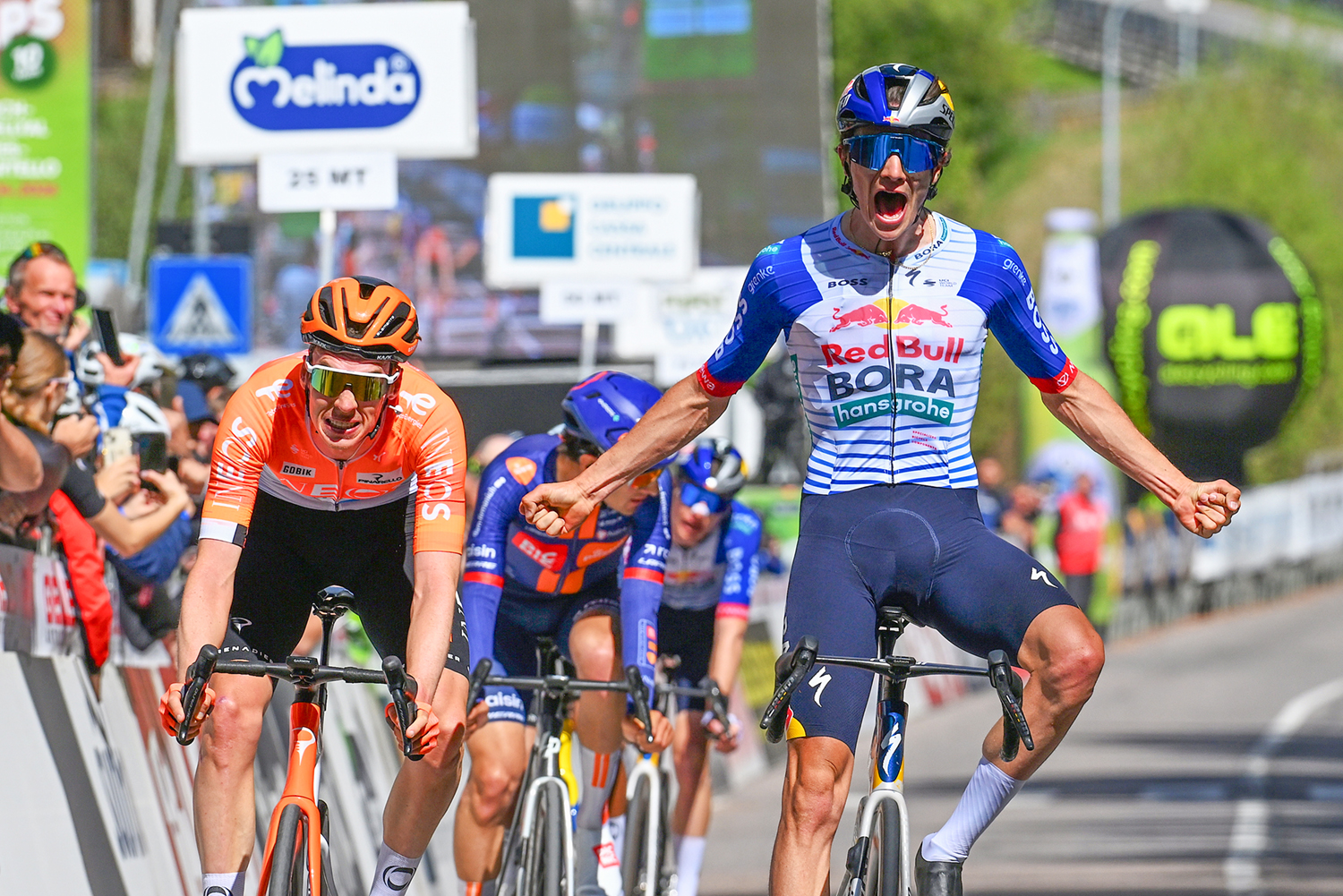 MARTELL, ITALY - APRIL 21: Giulio Pellizzari of Italy and Team Red Bull - BORA - hansgrohe celebrates at finish line as stage winner (R) ahead of Thymen Arensman of Netherlands and Team INEOS Grenadiers (L) during the 48th Tour of the Alps 2026, Stage 2 a 147.5km stage from Telfs to Martell - Val Martello 1153m on April 21, 2026 in Martell, Italy. (Photo by Tim de Waele/Getty Images)