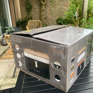 Everdure Cube BBQ in box on garden table