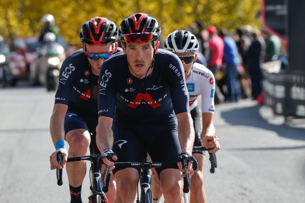 Team Ineos rider Australias Rohan Dennis C rides ahead of teammate Great Britains Tao Geoghegan Hart L and Team Sunweb rider Australias Jai Hindley during the 20th stage of the Giro dItalia 2020 cycling race a 198kilometer route between Alba and Sestriere on October 24 2020 Photo by Luca Bettini AFP Photo by LUCA BETTINIAFP via Getty Images