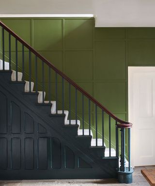 staircase panelling ideas green painted panelling
