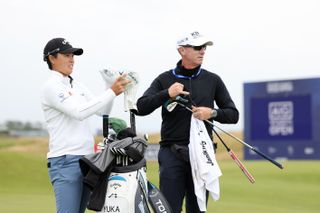 Yuka Saso of Japan and her caddie Dylan Vallequette