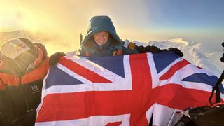 adriana brownlee on summit of final 8000m mountain