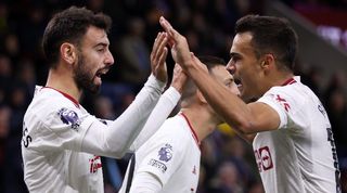 Bruno Fernandes and Sergio Reguilon celebrate after the Portuguese scores for Manchester United against Burnley in September 2023.