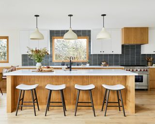 Kitchen layout ideas with white oak modern island and black styled splashback