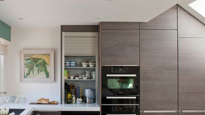 kitchen cabinetry with microwave