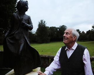 In Jane Austen's Footsteps with Gyles Brandreth - Gyles and a statue of Jane Austen