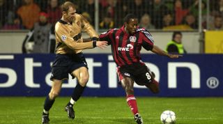 19 Feb 2002: Ze Roberto of Bayer Leverkusen is closed down by Igors Stepanovs of Arsenal during the UEFA Champions League Stage Two Group D match between Bayer Leverkusen and Arsenal at the BayArena in Leverkusen, Germany. The game ended 1-1. DIGITAL IMAGE \ Mandatory Credit: Stu Forster/Getty Images \