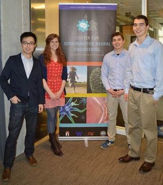 Left to right: James Wu, Tiffany Youngquist, Tyler Maxfield and Karl Marrett of the University of Washington created the game "Unicorb" for the 2014 Tech Sandbox competition. Users control game play via electrical signals generated by their smiles. These signals are picked up by non-invasive electrodes. Such brain-computer interfaces are researched at the NSF Engineering Research Center for Sensorimotor Neural Engineering, which is dedicated to developing new technologies to help people who are paralyzed or disabled. The Center also holds the annual Tech Sandbox competition.