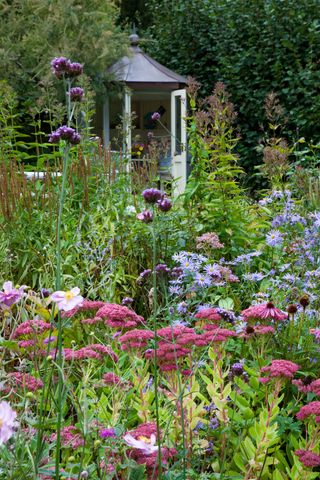 cottage garden with summer house