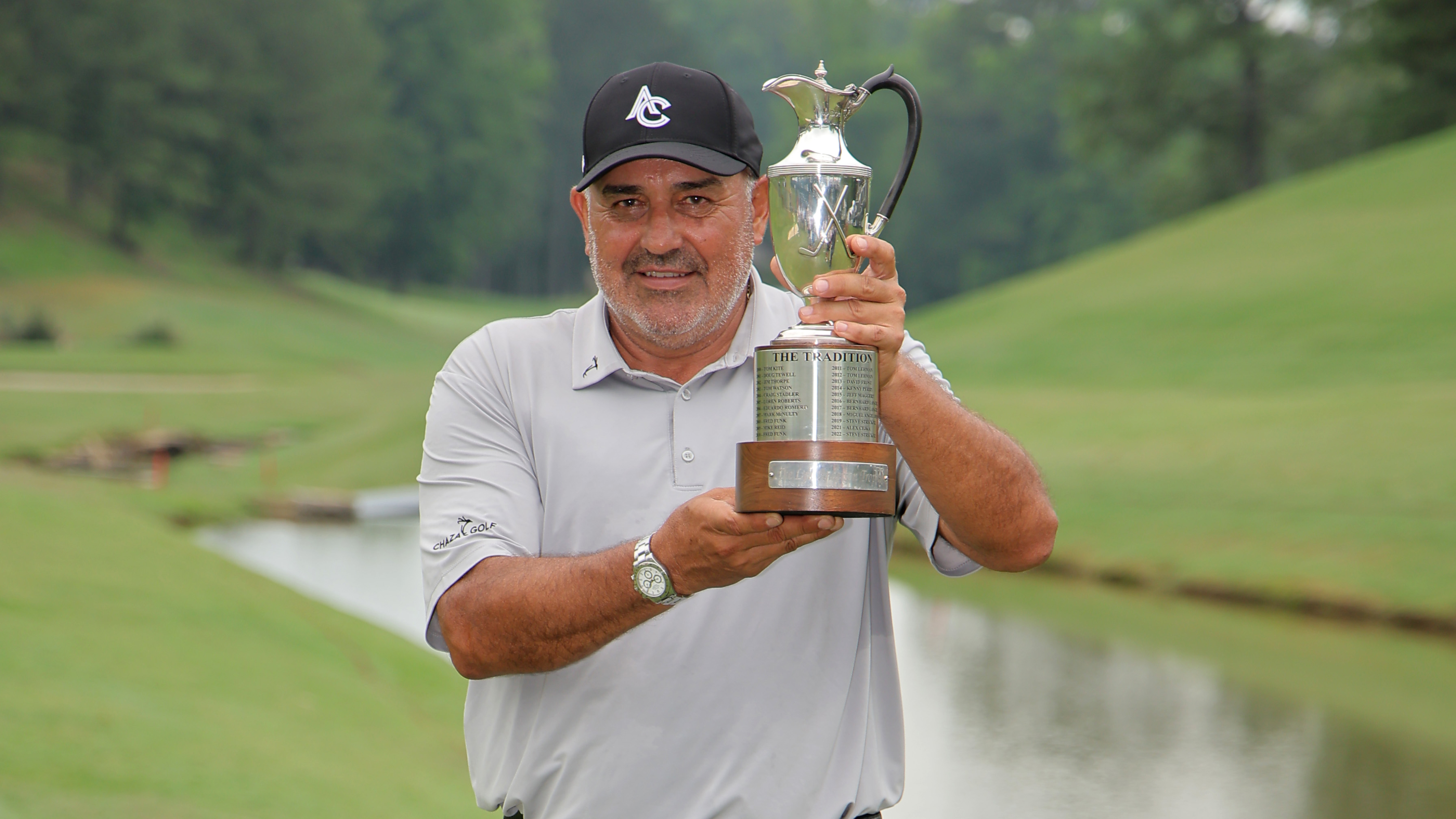 Angel Cabrera holds up the Regions Tradition trophy after winning in 2025
