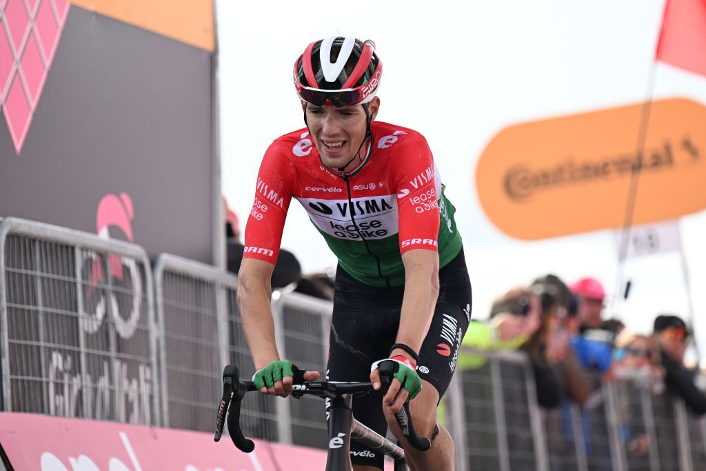 LIVIGNO MOTTOLINO ITALY MAY 19 Attila Valter of Hungary and Team Visma Lease a Bike crosses the finish line during the 107th Giro dItalia 2024 Stage 15 a 222km stage from Manerba del Garda to Livigno Mottolino 2387m UCIWT on May 19 2024 in Livigno Mottolino Italy Photo by Tim de WaeleGetty Images