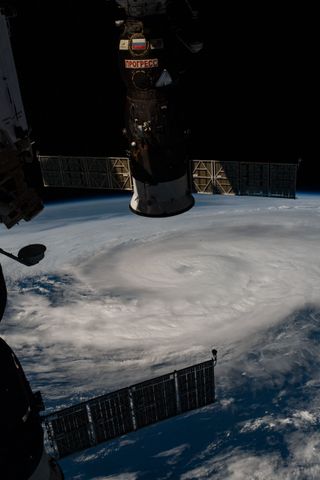 Hurricane Zeta churns in the Gulf of Mexico in this view captured from the International Space Station on Wednesday (Oct. 28), as the Category 2 storm approached Louisiana. In the upper foreground of the image is Russia's Progress 76 cargo resupply spacecraft, which is docked to the Russian Pirs module. At the bottom of the frame is Russia's Soyuz MS-17 spacecraft, which brought three crew members to the space station on Oct. 14.