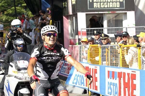 Stage winner Simon Gerrans (Cervelo) starts to raise his hands in celebration.