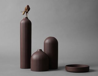 Tang Mode collection displaying dark brown vases and bowl