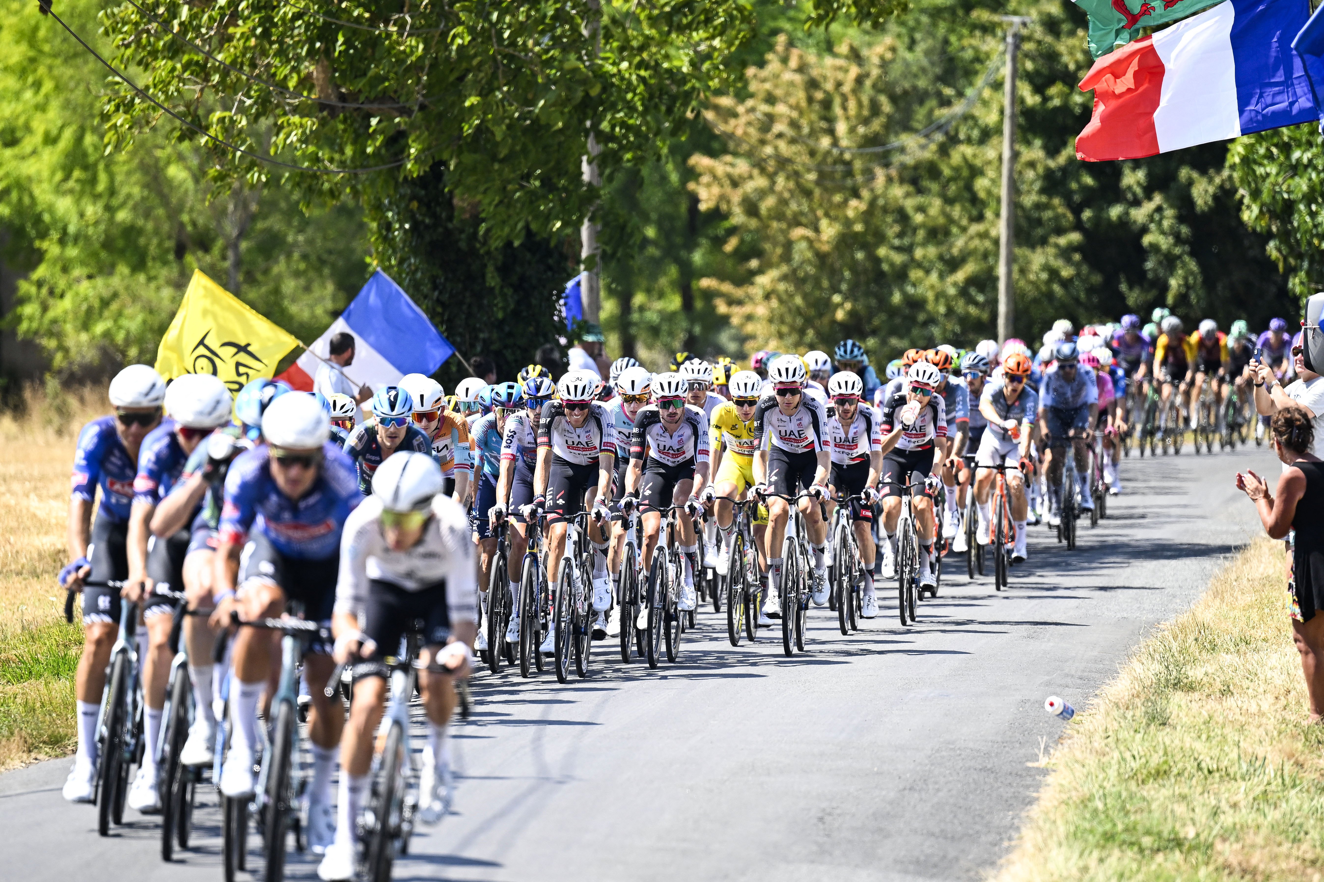 Tour de France peloton rides through the countryside