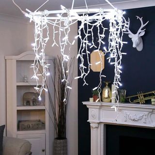 A DIY bedroom fairy light chandelier