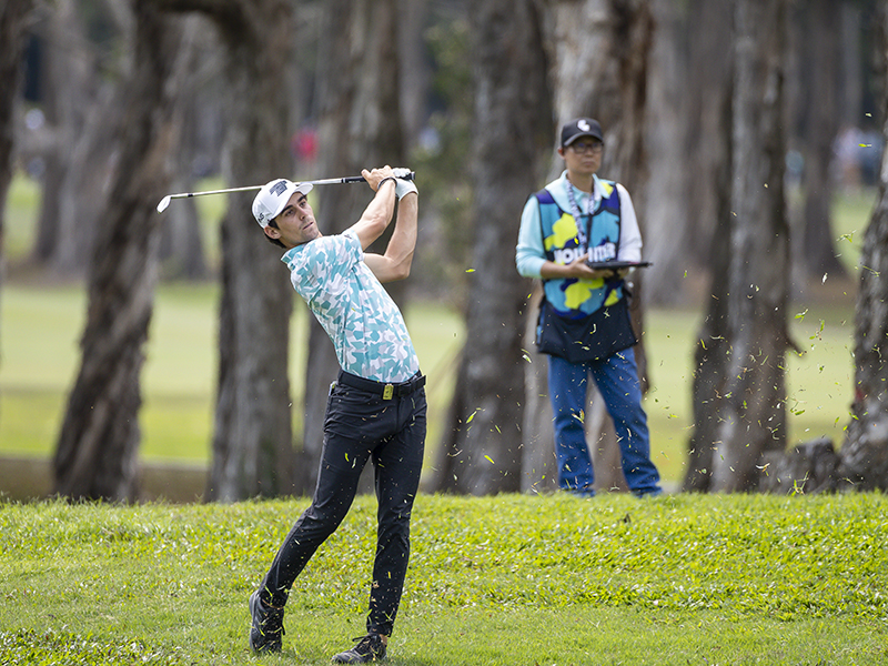 Joaquin Niemann hitting an iron shot at LIV Golf Hong Kong