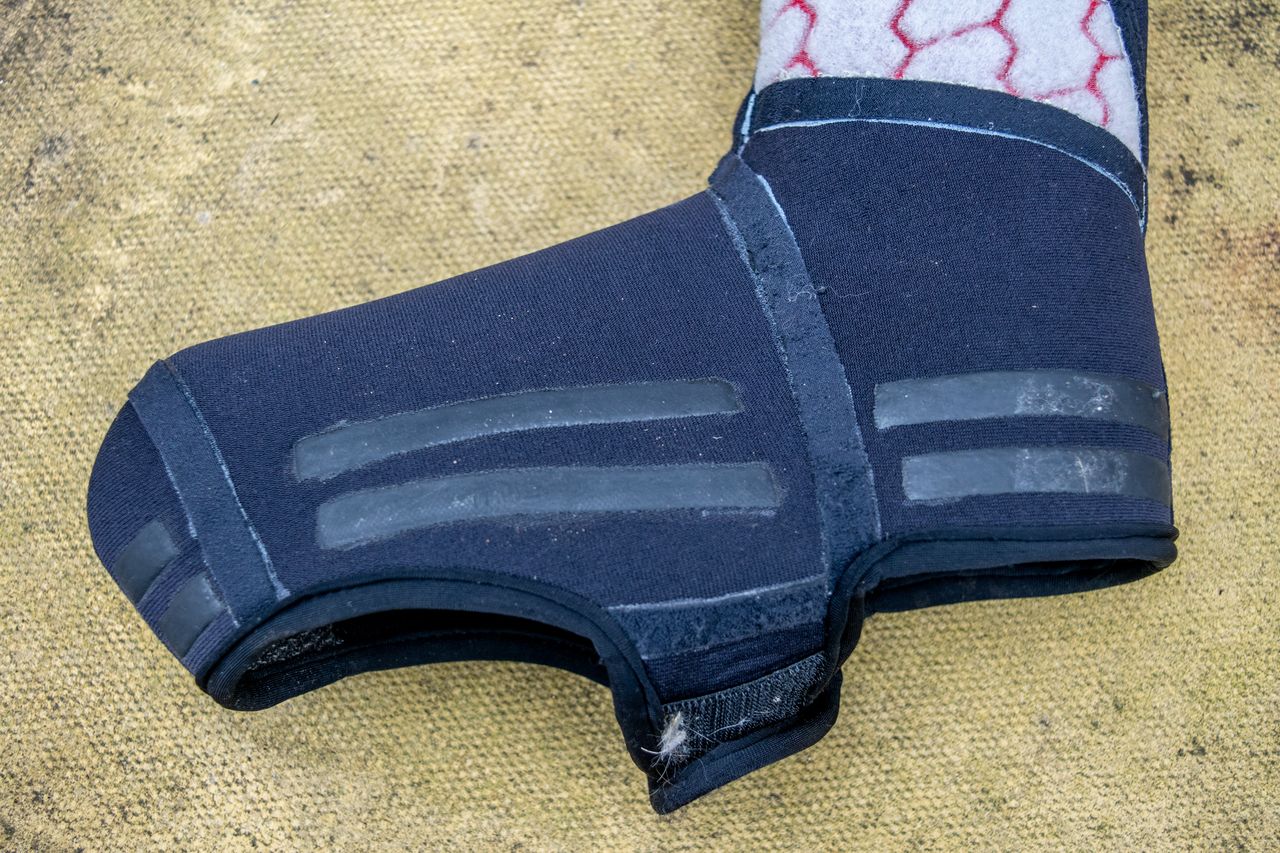 An inside out Pro Stealth overshoe showing the internal insulation