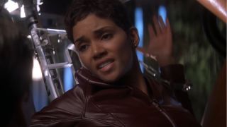 Halle Berry asks to be released from a restraining table in Die Another Day.