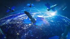 A CGI render of several satellites in low-Earth orbit, connected by bright lines and dots representing connectivity.