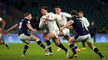 Ben Youngs of England is tripped Finn Russell of Scotland resulting in a yellow card during the Guinness Six Nations match between England and Scotland