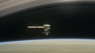 This simulated image shows the Cassini probe flying in between Saturn and the planet's closest ring, during the mission's Grande Finale in 2017.