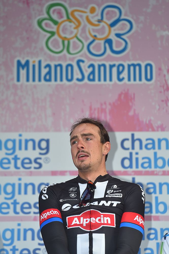 An emotional Degenkolb reacts on the podium.
