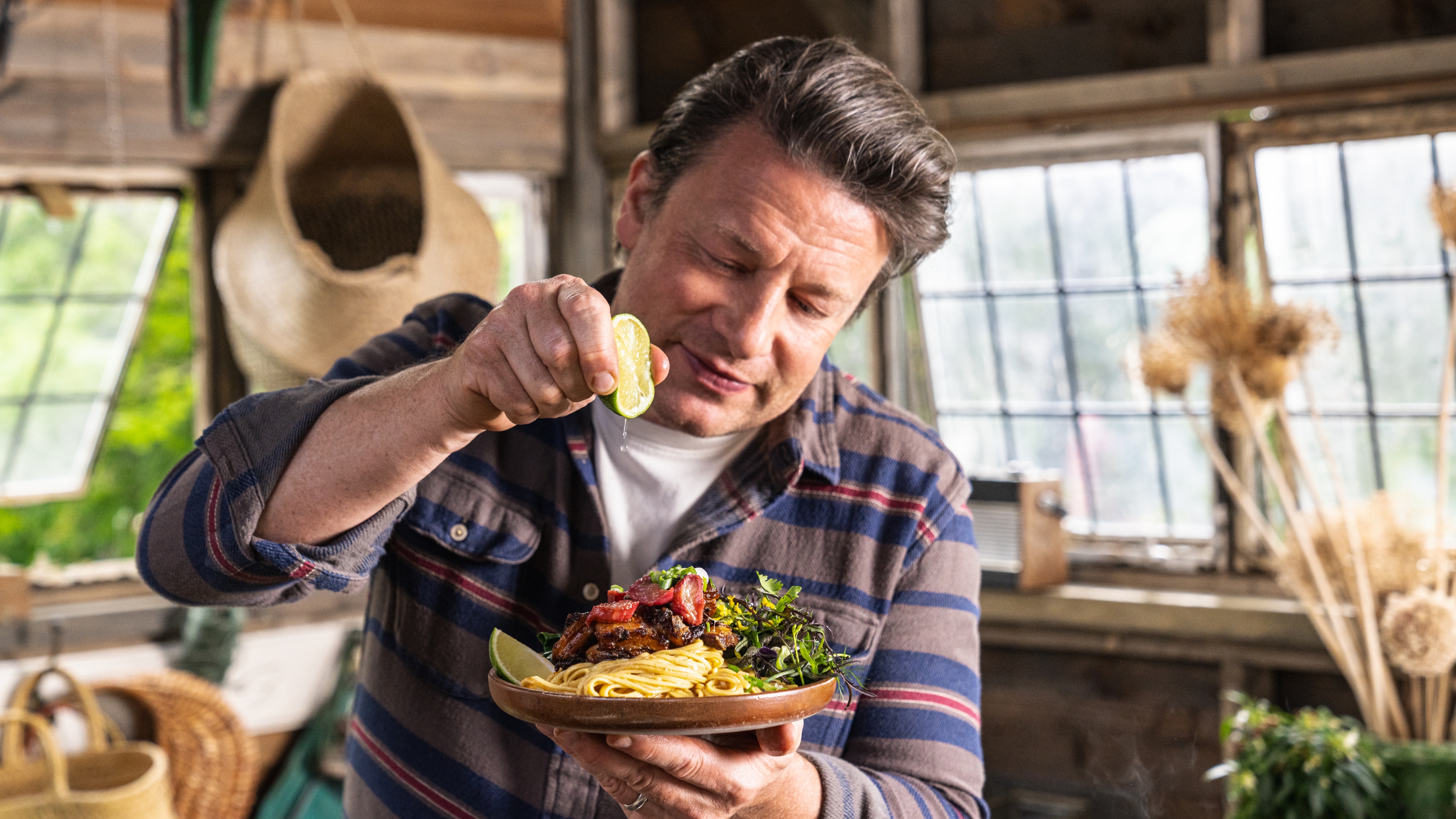 Jamie Oliver in his kitchen for Jamie Cooks Spring