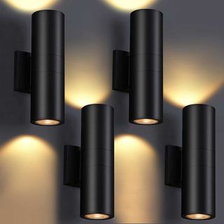 Four black cylindrical outdoor lights