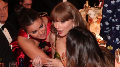 Taylor Swift and Selena Gomez attend the 81st Golden Globe Awards