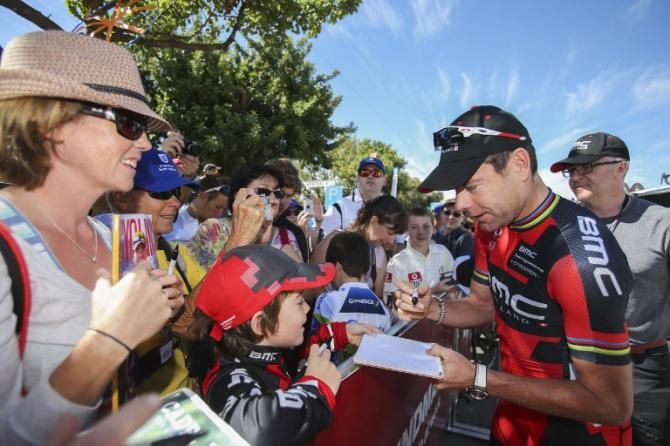 Cadel Evans signs autographs for fans