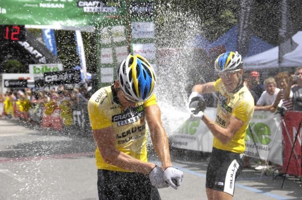 Team Bulls' Stefan Sahm and Karl Platt celebrate their victory with champagne