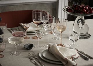 A Christmas tablescape with layered linens