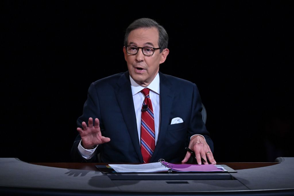 Debate moderator and Fox News anchor Chris Wallace directs the first presidential debate at Case Western Reserve University and Cleveland Clinic in Cleveland, Ohio, on September 29, 2020.