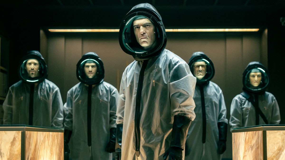 Berlin and the crew in hazmat suits inside the vault in Money Heist: Berlin episode 4