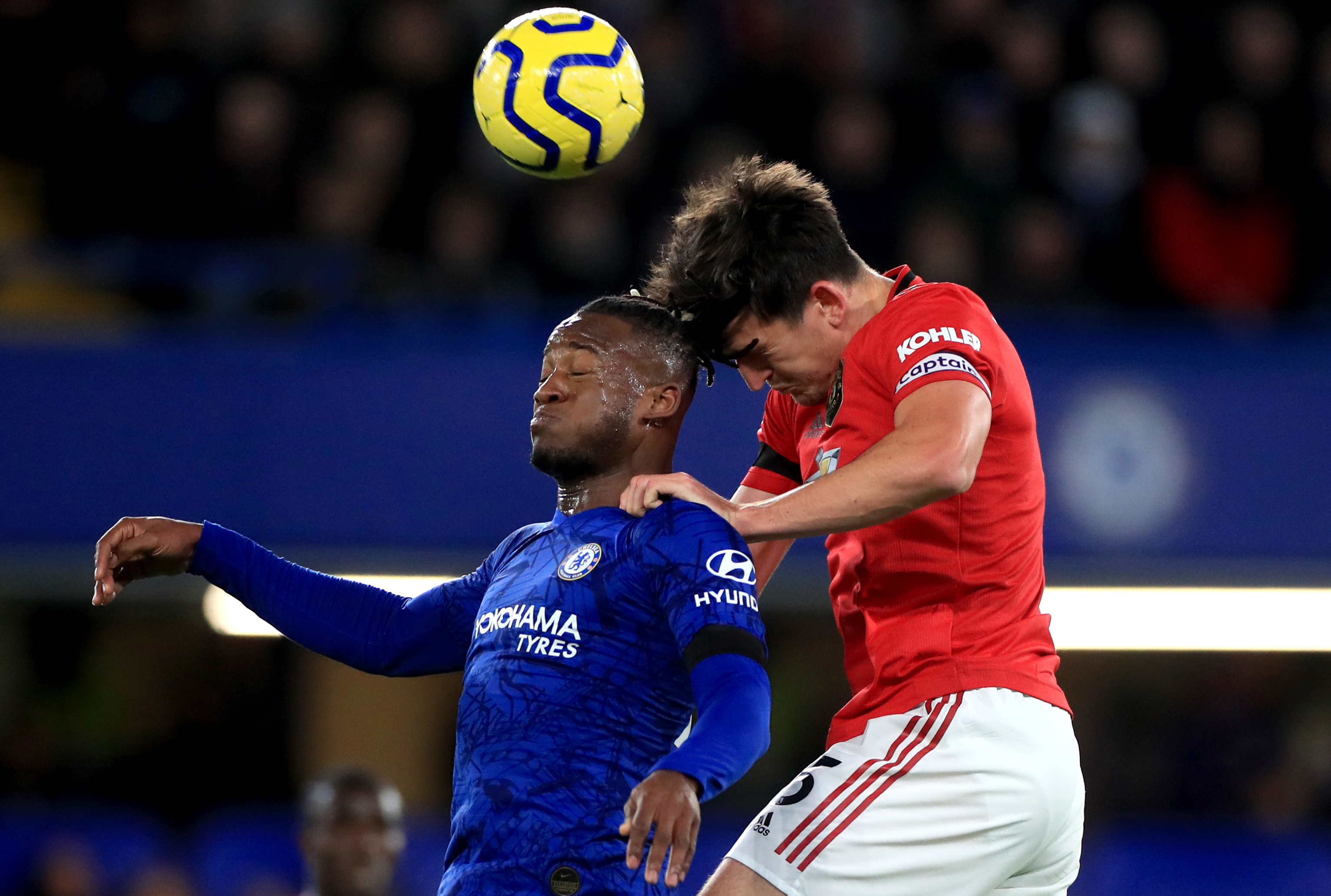 Harry Maguire, right, and Michy Batshuayi