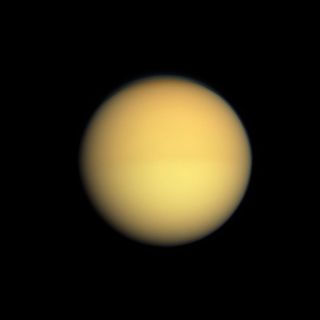 Saturn's moon, Titan, is thought to boast clouds that rain methane down onto its surface, as well as a methane ocean. Astronomers studying the cloud cover over other planets could measure the changes in brightness to determine the layout of land beneath.