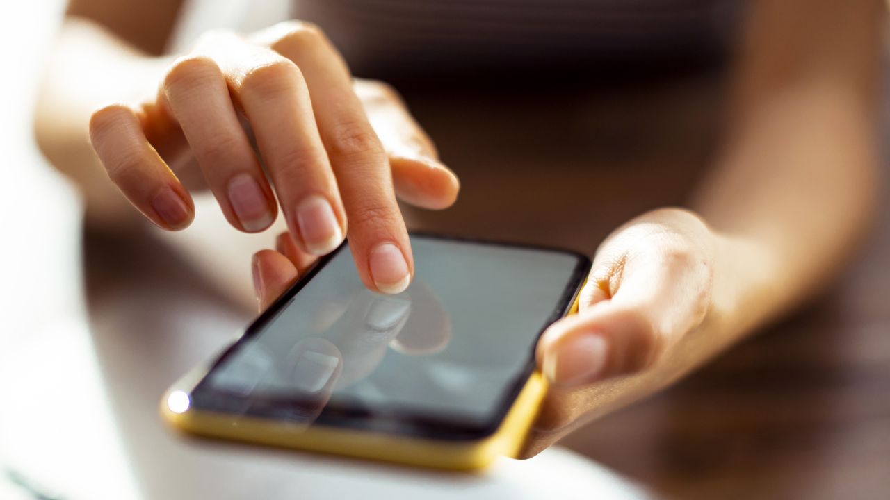 Woman using mobile phone 