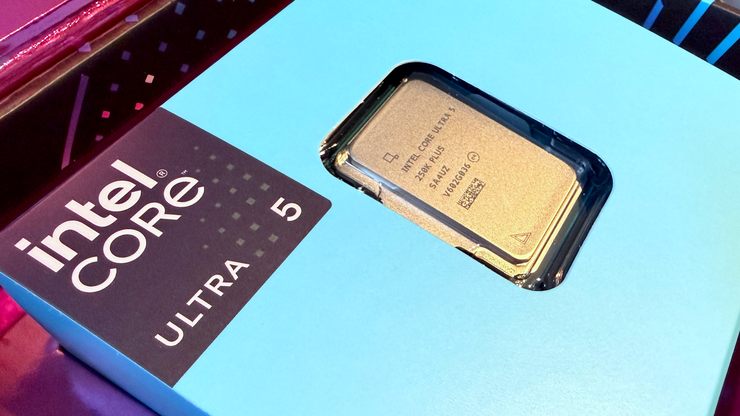 A photograph of Intel's Core Ultra 5 250K Plus processor inside the retail packaging for the chip