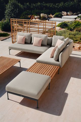outdoor sofa ideas: corner sofa on patio