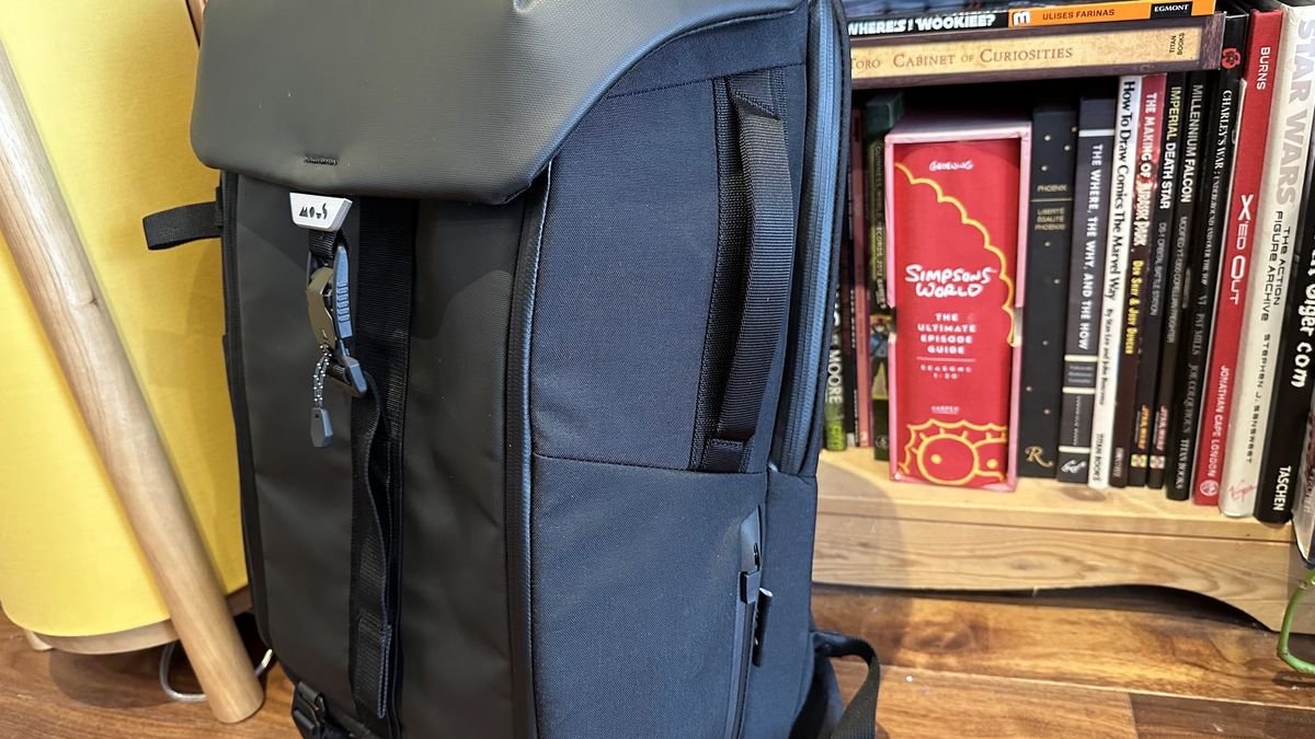 Mous Extreme Commuter backpack on a wooden floor in a living room