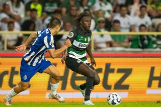 Geovany Quenda of Sporting (R) runs with the ball during the match between Sporting CP and FC Porto at Estadio Municipal de Aveiro on August 3, 2024 in Aveiro, Portugal.