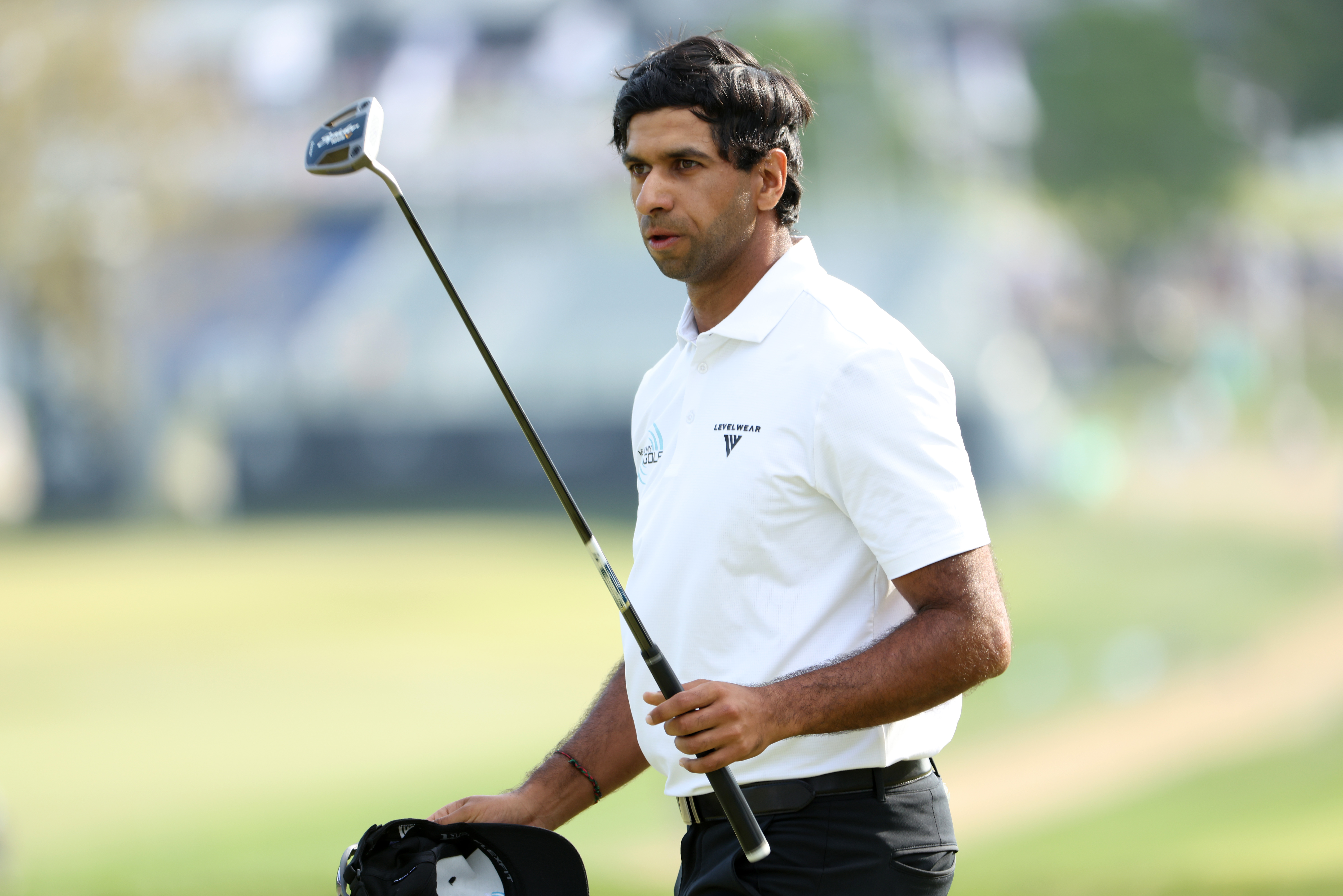 Aaron Rai reacts on the 18th hole green after finishing the third round of the PGA Championship at Aronimink Golf Club
