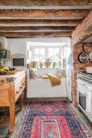 rustic kitchen with patterned boho style rug