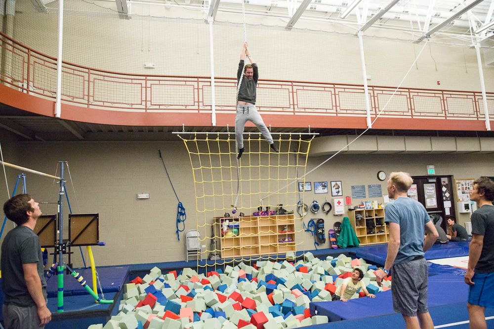 Colin Joyce hangs above the foam pool at Rally's winter camp